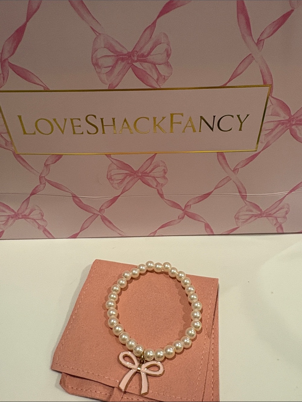 LoveShackFancy Ivory Pearl Bracelet with Pink Bow Charm